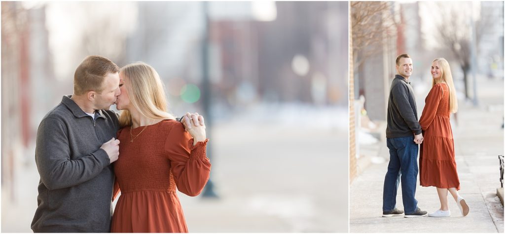 Engaged couple walking Downtown Sioux Falls during winter