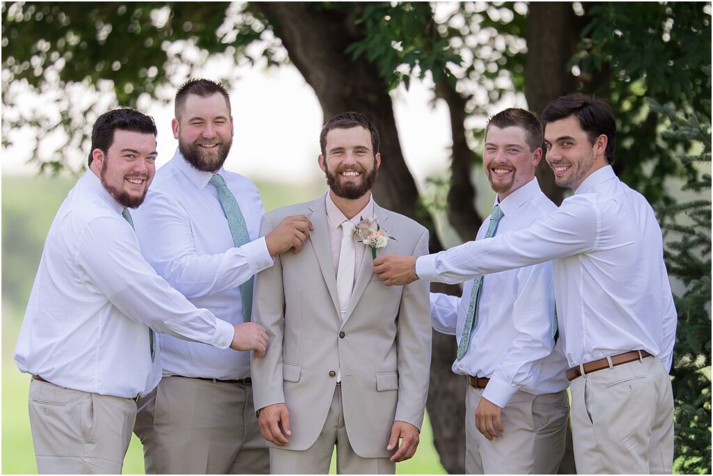 South Dakota Outdoor Wedding - groomsmen and groom