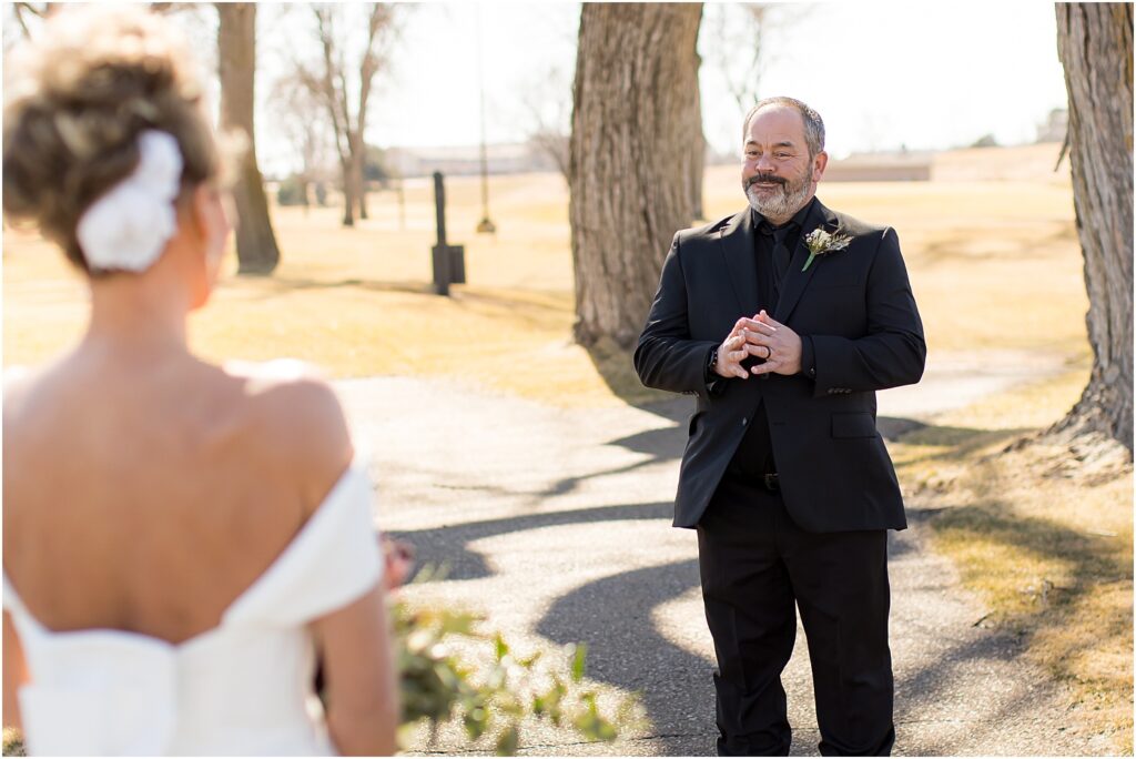 Sioux Falls Country Club Spring wedding - First Look with groom